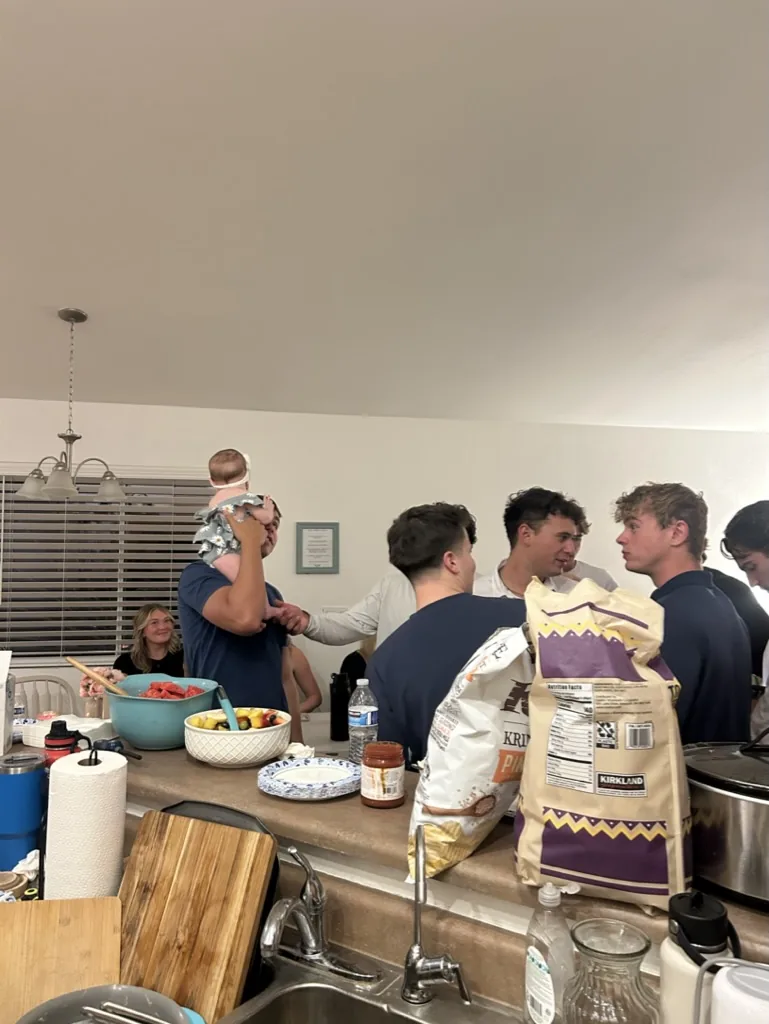 Students gathered in the kitchen