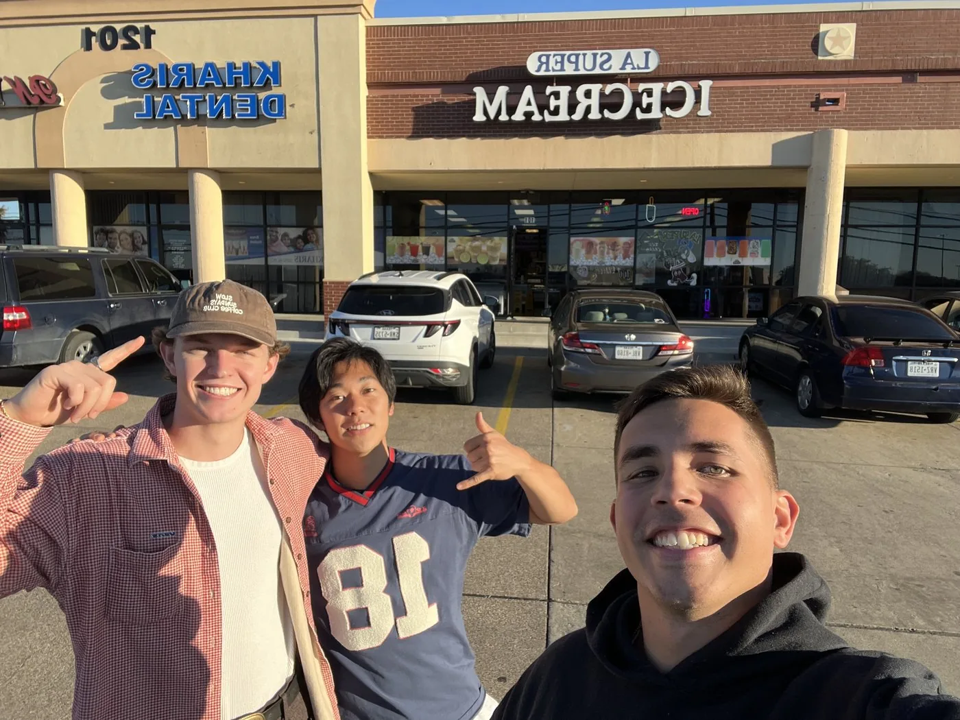 Noah, Blake, and Shuma outside an ice cream shop