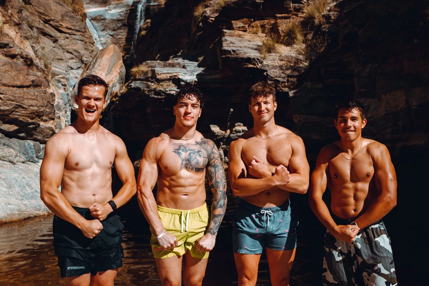 Tyler and the guys including Gunner at a swimming hole