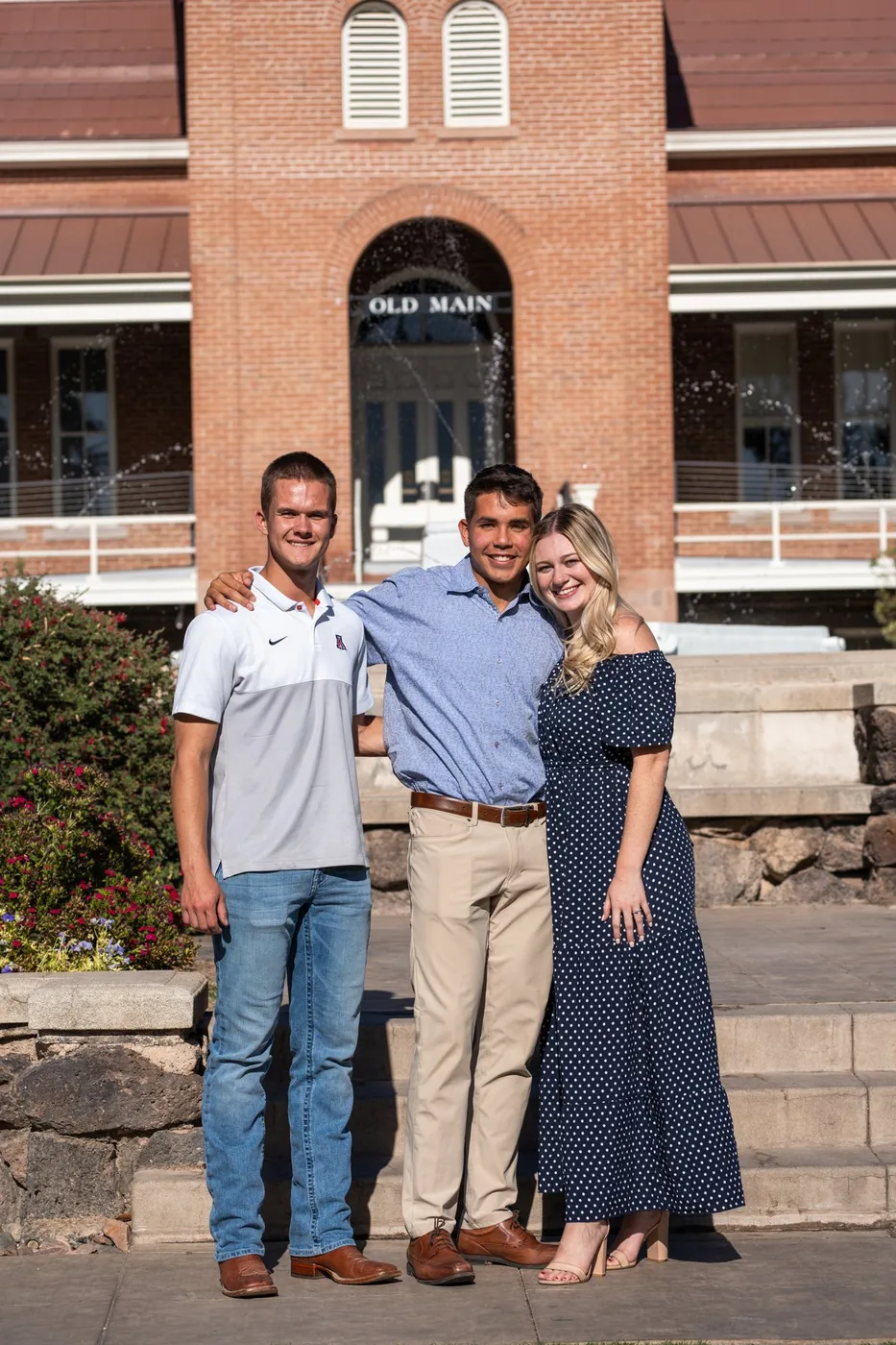 Tyler with Blake and Hannah in front of Old Main